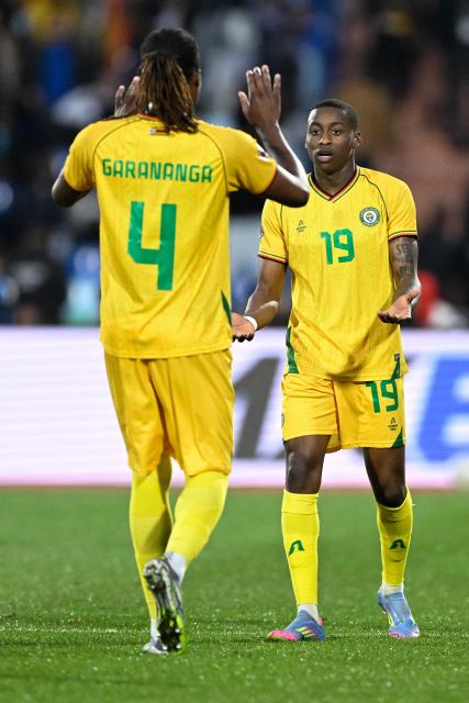 Zimbabwe's forward #19 Tawanda Maswanhise (R) celebrates after the second goal during the Africa Cup of Nations (CAN) Group B football match between Zimbabwe and South Africa at Marrakesh Stadium in Marrakesh on December 29, 2025. (Photo by Khaled DESOUKI / AFP)