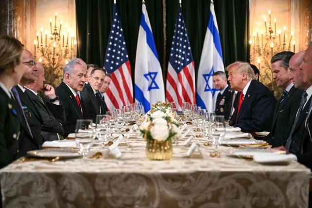 TOPSHOT - US President Donald Trump (center R) meets with Israeli Prime Minister Benjamin Netanyahu (center L) during a bilateral meeting at Trump’s Mar-a-Lago residence in Palm Beach, Florida, on December 29, 2025. (Photo by Jim WATSON / AFP)