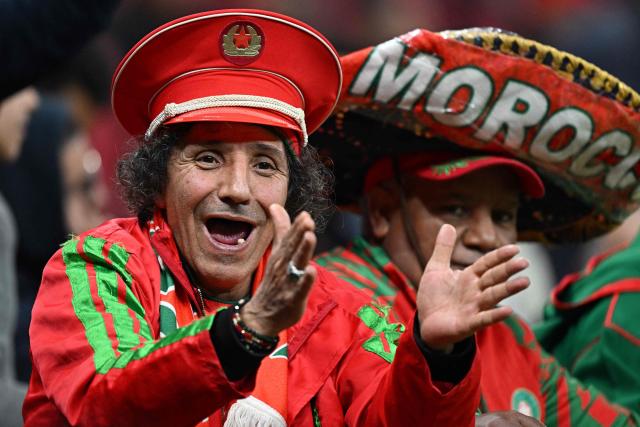 TOPSHOT - Morocco supporters arrive for the Africa Cup of Nations (CAN) group stage football match between Zambia and Morocco at Prince Moulay Abdellah Stadium in Rabat on December 29, 2025. (Photo by Gabriel BOUYS / AFP)