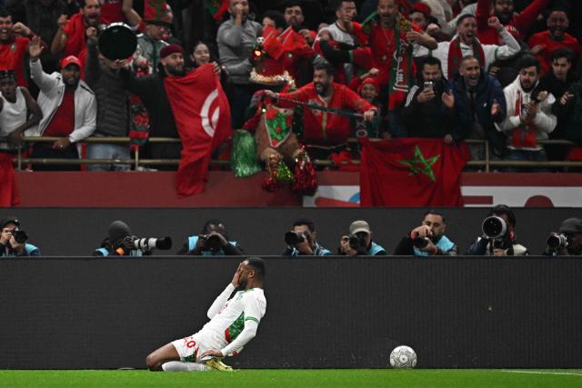 Morocco's forward #20 Ayoub El Kaabi celebrates scoring his team's first goal during the Africa Cup of Nations (CAN) group stage football match between Zambia and Morocco at Prince Moulay Abdellah Stadium in Rabat on December 29, 2025. (Photo by Gabriel BOUYS / AFP)