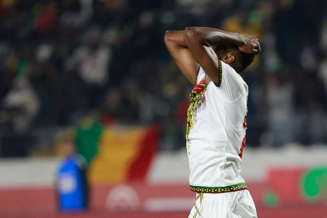 Mali's midfielder #04 Amadou Haidara reacts after being sent off during the Africa Cup of Nations (CAN) Group A football match between Comoros and Mali at Mohammed V Stadium in Casablanca on December 29, 2025. (Photo by Abdel Majid BZIOUAT / AFP)