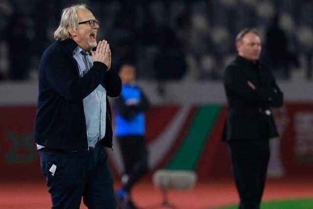 Mali's head coach Tom Saintfiet (L) reacts during the Africa Cup of Nations (CAN) Group A football match between Comoros and Mali at Mohammed V Stadium in Casablanca on December 29, 2025. (Photo by Abdel Majid BZIOUAT / AFP)