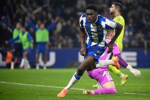 FC Porto's Spanish forward #09 Samuel Omorodion scores the opening goal during the Portuguese League football match between FC Porto and AVS at Dragao stadium in Porto on December 29, 2025. (Photo by Miguel RIOPA / AFP)