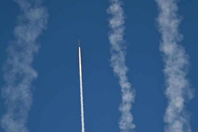 Chinese People's Liberation Army (PLA) soldiers fire a rocket into the air as they conduct military drills on Pingtan island, in eastern China's Fujian province, the closest point to Taiwan, on December 30, 2025. Taiwan said Tuesday it had detected 130 Chinese military aircraft near the island in a 24-hour period, as China began a second day of live-fire drills. (Photo by ADEK BERRY / AFP)