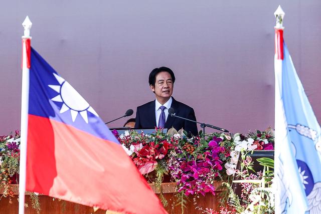 (FILES) Taiwan's President Lai Ching-te delivers a speech during National Day celebrations at the Presidential Palace in Taipei on October 10, 2025. Lai Ching-te vowed on December 30, 2025, that Taiwan would not be "escalating the conflict" or provoke disputes, as China kicked off a second day of live-fire drills around the self-ruled island. (Photo by I-Hwa Cheng / AFP)