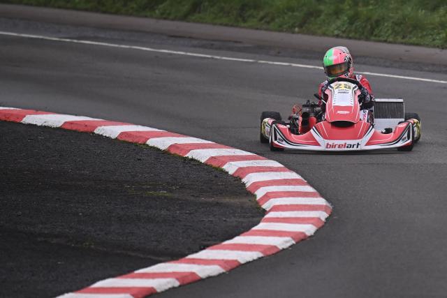 This photo taken on November 15, 2025 shows 15-year-old Skye Parker during a day out at the Shenington Kart Racing Club track in Shenington, central England. A dozen girls whizzed around an English karting track, part of a pioneering drive to draw women into motorsports and maybe even race to the top in male-dominated Formula 1. (Photo by Paul ELLIS / AFP)