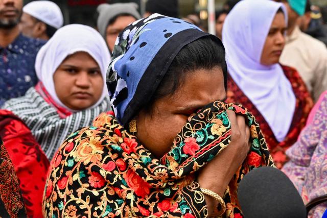Supporters of Bangladesh's former prime minister Khaleda Zia mourn her death in Dhaka on December 30, 2025. Zia, who many believed would sweep elections next year to lead her country once again, died on December 30 aged 80, her Bangladesh Nationalist Party (BNP) said. (Photo by MUNIR UZ ZAMAN / AFP)
