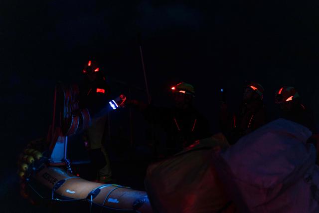 Crew members of the “Ocean Viking” rescue ship, operated by the French NGO SOS Mediterranee, take part in a team night exercise to prepare for a rescue situation at sea with a "RHIB", an inflatable dinghy, on their way to the search-and-rescue zone in international waters in the Mediterranean Sea, on December 29, 2025. Migrants rescue ship "Ocean Viking" is preparing to return to operations following the attack it suffered on August 24, 2025 when Libyan Coast Guard forces fired directly on the rescue vessel operated by the NGO SOS Mediterranee. (Photo by Sameer Al-DOUMY / AFP)