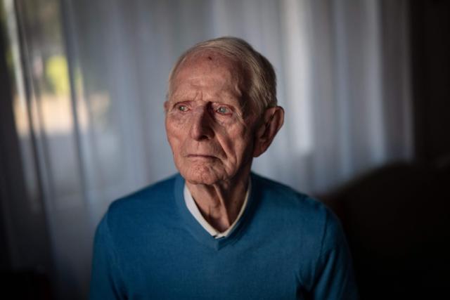 (FILES) French WWII resistance fighter Henri Mosson, who was deported to the Nazi built Natzweiler-Struthof concentration camp and the Dachau camp, poses in Dijon, central eastern France, on October 28, 2024. Henri Mosson, the oldest survivor of the Natzweiler-Struthof camp in Alsace, the only Nazi camp in France, died at the age of 101 on December 29, 2025 in Dijon, his son told AFP. The French resistance fighter, who died a few days before his 102nd birthday on January 5th had been sentenced to death on June 27, 1943 at the age of 19 for obtaining weapons for the Burgundian resistance. (Photo by ARNAUD FINISTRE / AFP)
