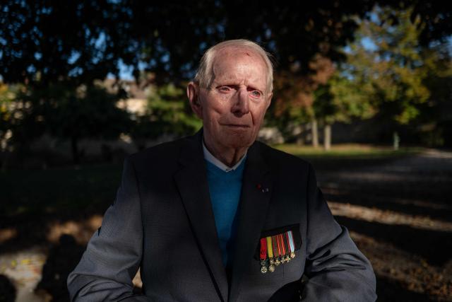 (FILES) French WWII resistance fighter Henri Mosson, who was deported to the Nazi built Natzweiler-Struthof concentration camp and the Dachau camp, poses in Dijon, central eastern France, on October 28, 2024. Henri Mosson, the oldest survivor of the Natzweiler-Struthof camp in Alsace, the only Nazi camp in France, died at the age of 101 on December 29, 2025 in Dijon, his son told AFP. The French resistance fighter, who died a few days before his 102nd birthday on January 5th had been sentenced to death on June 27, 1943 at the age of 19 for obtaining weapons for the Burgundian resistance. (Photo by ARNAUD FINISTRE / AFP)