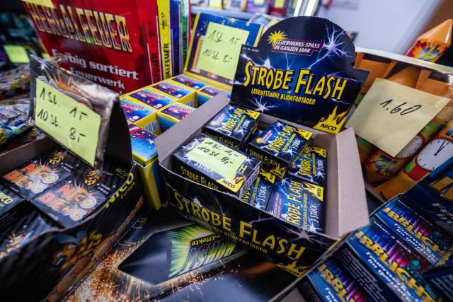 Pyrotechnic and explosive devices are on display in a temporary outlet selling fireworks in Berlin on December 30, 2025, ahead of New Year celebrations in the German capital. (Photo by John MACDOUGALL / AFP)