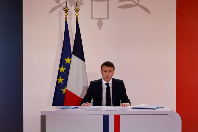 (FILES) France's President Emmanuel Macron gestures as he speaks during a press conference to present the course for France's newly appointed government at The Elysee Palace in Paris on January 16, 2024. From threats to Europe to societal issues surrounding end-of-life care and the internet, Emmanuel Macron, facing record unpopularity, presented his New Year's wishes to the French people on December 31, 2025 for 2026, his last full year at the Elysee Palace, which he intends to make ‘a year of action’ despite his limited room for manoeuvre. (Photo by Ludovic MARIN / AFP)