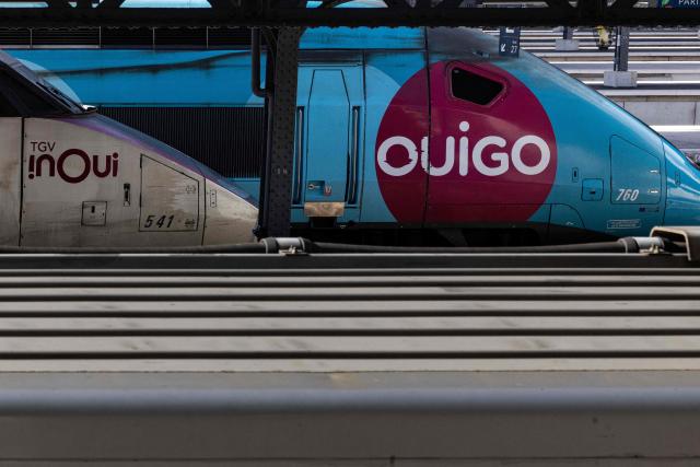 (FILES) A photo shows the SNCF's TGV Inoui and Ouigo trains at the Gare de l'Est train station in Paris on October 5, 2025. SNCF Voyageurs announced on December 30, 2025 that fares for SNCF's TGV Inoui and Ouigo trains are expected to increase by ‘an average of 1%’ next year, which is ‘below inflation’ and is expected to reach +1.5% in June 2026 according to INSEE. (Photo by JOEL SAGET / AFP)