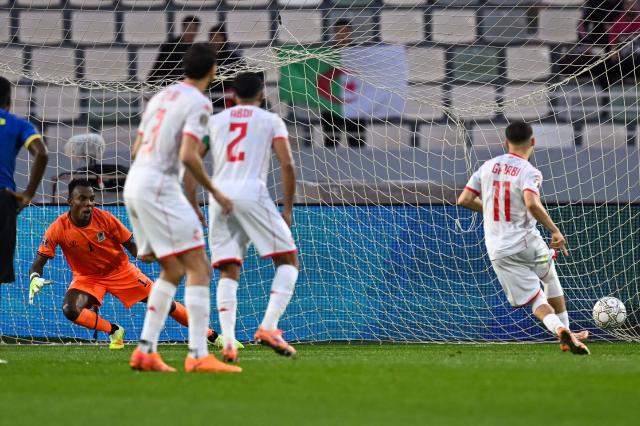 Tunisia's midfielder #11 Ismael Gharbi scores a penalty during the Africa Cup of Nations (CAN) Group C football match between Tanzania and Tunisia at Rabat Olympic Stadium in Rabat on December 30, 2025. (Photo by Paul ELLIS / AFP)