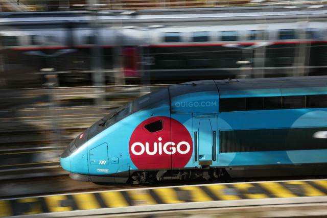 (FILES) A picture taken on October 6, 2023, on Paris, shows a OUIGO TGV train. SNCF Voyageurs announced on December 30, 2025 that fares for SNCF's TGV Inoui and Ouigo trains are expected to increase by ‘an average of 1%’ next year, which is ‘below inflation’ and is expected to reach +1.5% in June 2026 according to INSEE. (Photo by Thomas SAMSON / AFP)