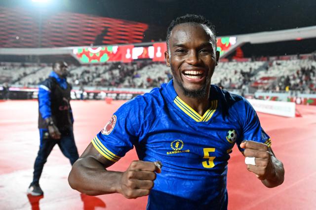 Tanzania's defender #05 Dickson Job celebrates their qualification after the Africa Cup of Nations (CAN) Group C football match between Tanzania and Tunisia at Rabat Olympic Stadium in Rabat on December 30, 2025. (Photo by Paul ELLIS / AFP)