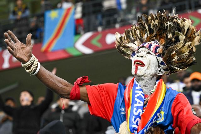 A Democratic Republic of Congo supporter cheers prior the Africa Cup of Nations (CAN) Group D football match between Botswana and Democratic Republic of Congo at El Madina Stadium in Rabat on December 30, 2025. (Photo by SEBASTIEN BOZON / AFP)