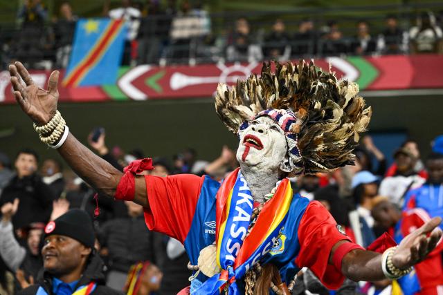 TOPSHOT - Democratic Republic of Congo supporter cheers during the Africa Cup of Nations (CAN) Group D football match between Botswana and Democratic Republic of Congo at Rabat Olympic Stadium in Rabat, Morocco on December 30, 2025. (Photo by SEBASTIEN BOZON / AFP)