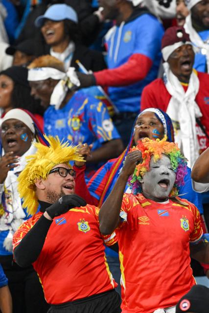 Democratic Republic of Congo supporters cheer during the Africa Cup of Nations (CAN) Group D football match between Botswana and Democratic Republic of Congo at El Madina Stadium in Rabat on December 30, 2025. (Photo by SEBASTIEN BOZON / AFP)
