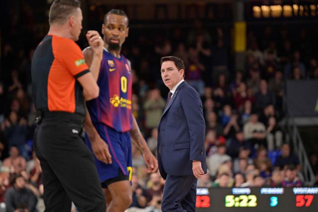 Barcelona’s Spanish head coach Xavi Pascual leaves the game after being ejected during the Euroleague basketball between FC Barcelona and Monaco at Palau Blaugrana Arena in Barcelona, Spain on December 30, 2025. (Photo by MANAURE QUINTERO / AFP)