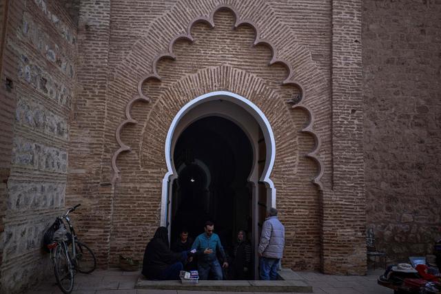 A man leaves the Koutoubia Mosque in Marrakesh on December 30, 2025. (Photo by Khaled DESOUKI / AFP)