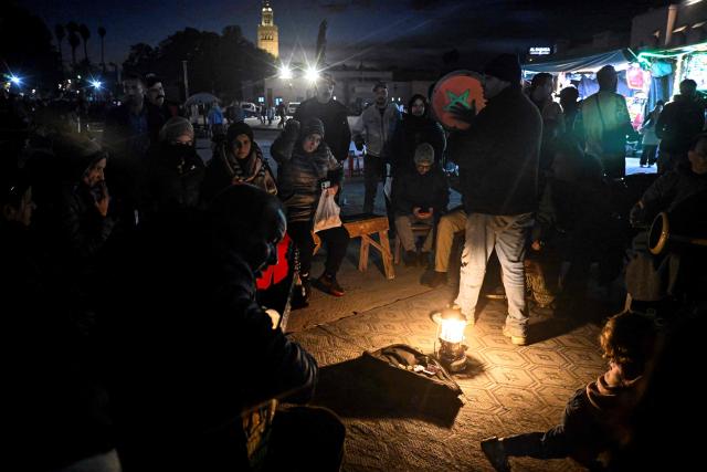 Moroccan musicians perform in the Jemaa el-Fnaa square in Marrakesh on December 30, 2025. (Photo by Khaled DESOUKI / AFP)