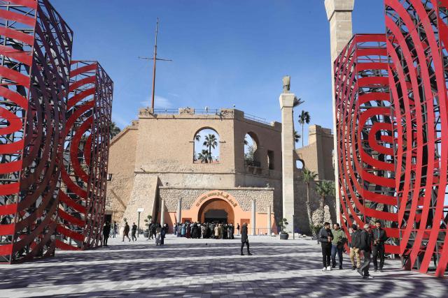 Crowds of Libyan families and students visit the National Museum after its reopening, following a closure of more than a decade in the Libyan capital Tripoli on December 23, 2025. In a historic building in central Tripoli, Libyans wander past ancient statues and artefacts, rediscovering a heritage that transcends political divides at their national museum which reopened this month after a 2011 uprising. (Photo by Mahmud Turkia / AFP)