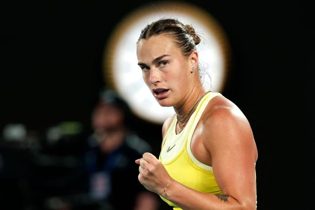 (FILES) Belarus' Aryna Sabalenka reacts after a point against USA's Madison Keys during the women's singles final on day fourteen of the Australian Open tennis tournament in Melbourne on January 25, 2025. Carlos Alcaraz and Jannik Sinner are gearing up for more world domination in 2026, starting at the Australian Open, while Aryna Sabalenka is bubbling with confidence as she chases further Grand Slam success. (Photo by Martin KEEP / AFP)
