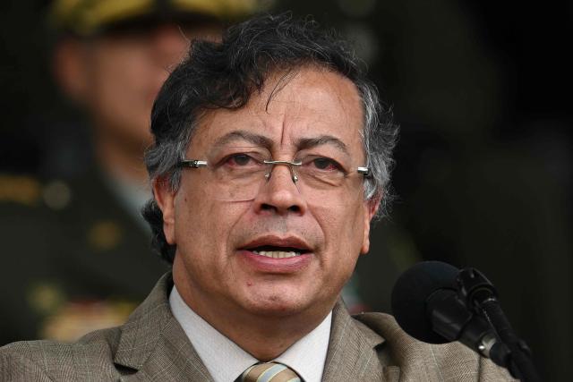 (FILES) Colombia's President Gustavo Petro delivers a speech during the commemoration of the 134th anniversary of the National Police and the promotion of officers at the General Santander Police Academy in Bogota on November 13, 2025. Colombian President Gustavo Petro said on December 30, 2025, that the United States bombed a cocaine factory in the Venezuelan city of Maracaibo, which he linked to the Colombian guerrilla group ELN. (Photo by Raul ARBOLEDA / AFP)