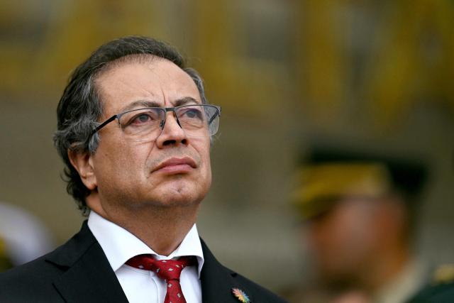 (FILES) Colombian President Gustavo Petro attends a military ceremony to swear in the new General Commander of the Military Forces, Admiral Francisco Cubides, at the Jose Maria Cordova Military school in Bogota on July 09, 2024. Colombian President Gustavo Petro said on December 30, 2025, that the United States bombed a cocaine factory in the Venezuelan city of Maracaibo, which he linked to the Colombian guerrilla group ELN. (Photo by LUIS ACOSTA / AFP)