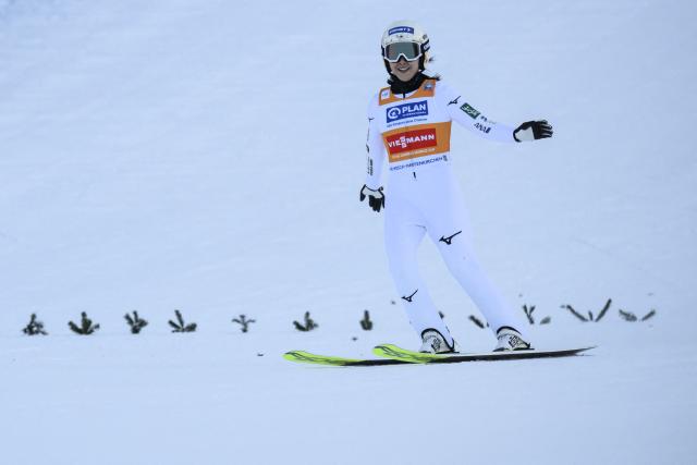 Japan’s Nozomi Maruyama reacts while landing her jump during the FIS Ski Jumping Two Nights Tour women's World Cup in Garmisch-Partenkirchen southern Germany on December 31, 2025. (Photo by Philipp Guelland / AFP)