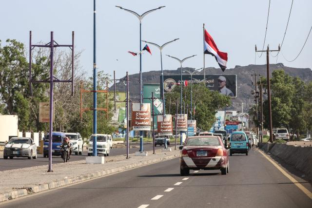 Cars drive on a road in Aden, where the internationally recognised government is based, on December 31, 2025. Saudi Arabia welcomes the UAE's troop withdrawal in Yemen but tensions will remain while Abu Dhabi backs separatists there, a source close to the Saudi government told AFP on December 31, 2025. The UAE-backed Southern Transitional Council's forces have swept through divided Yemen's government-run areas this month, seizing much of resource-rich Hadramawt bordering Saudi Arabia and neighbouring Mahra province. (Photo by Saleh Al-OBEIDI / AFP)