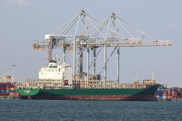 A photograph shows a ship docked in the southern port city of Aden, where the internationally recognised government is based, on December 31, 2025. (Photo by Saleh Al-OBEIDI / AFP)