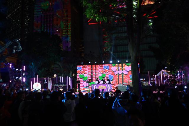 Hong Kong City chief John Lee arrives at the New Year’s countdown celebrations in Central, Hong Kong, on December 31, 2025. (Photo by May JAMES / AFP)