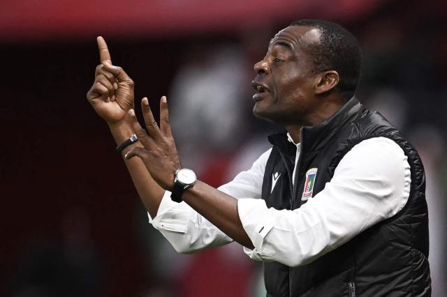Equatorial Guinea's head coach Juan Micha gives instructions to his players from the touchline during the Africa Cup of Nations (CAN) Group E football match between Equatorial Guinea and Algeria at Moulay Hassan Stadium in Rabat on December 31, 2025. (Photo by Paul ELLIS / AFP)