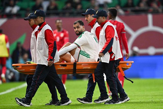 Algeria's defender #4 Mohamed Amine Tougai is taken away on a stetcher during the Africa Cup of Nations (CAN) Group E football match between Equatorial Guinea and Algeria at Moulay Hassan Stadium in Rabat on December 31, 2025. (Photo by Gabriel BOUYS / AFP)