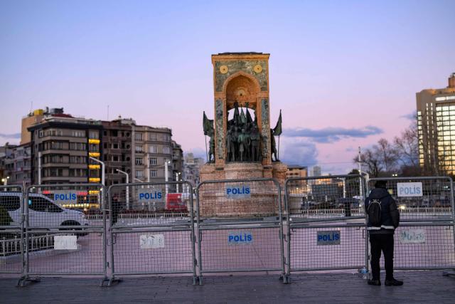 This photograph shows metal barriers set up to control access around Taksim Square ahead of the 2026 New Year’s Day celebrations in Istanbul on December 31, 2025. (Photo by Yasin AKGUL / AFP)