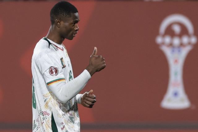 Cameroon's forward #26 Christian Kofane celebrates scoring his team's second goal during the Africa Cup of Nations (CAN) Group F football match between Mozambique and Cameroon at the Grand Stadium in Agadir on December 31, 2025. (Photo by FRANCK FIFE / AFP)