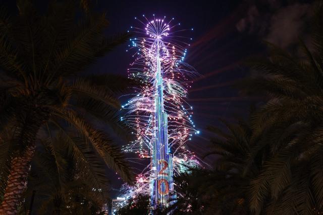Fireworks light up the sky around the Burj Khalifa during New Year celebrations in Dubai early on January 1, 2026. (Photo by Fadel SENNA / AFP)