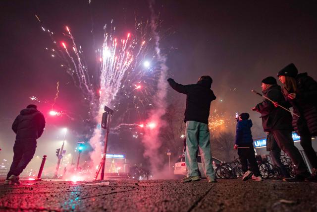 Revellers set off fireworks in the neighbourhood of Schoeneberg to celebrate the New Year, in Berlin on January 1, 2026. (Photo by Odd ANDERSEN / AFP)