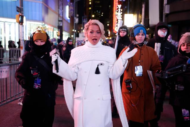 British singer and actress Rita Ora speaks as revelers gather to celebrate New Year's Eve in Times Square on December 31, 2025 in New York. (Photo by John Lamparski / AFP)