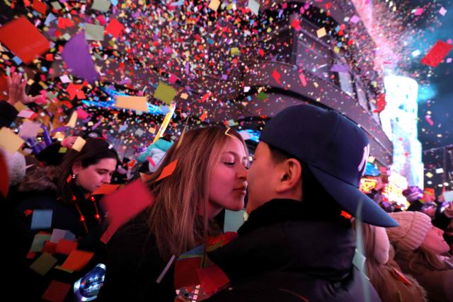 Acouple kiss during the New Year's Eve celebrations and ball drop in Times Square in New York on January 1, 2026. (Photo by John Lamparski / AFP)