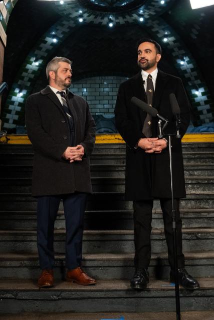 New York mayor-elect Zohran Mamdani (R) introduces Mike Flynn to lead the NYC Department of Transportation after he was sworn in on January 1, 2026 in New York. New York mayor-elect Zohran Mamdani is set to become the US city's first Muslim mayor, and the youthful optimism of his Democratic Socialist platform will be put to the test as he takes office on January 1, 2026, with high expectations. (Photo by Amir Hamja / POOL / AFP)