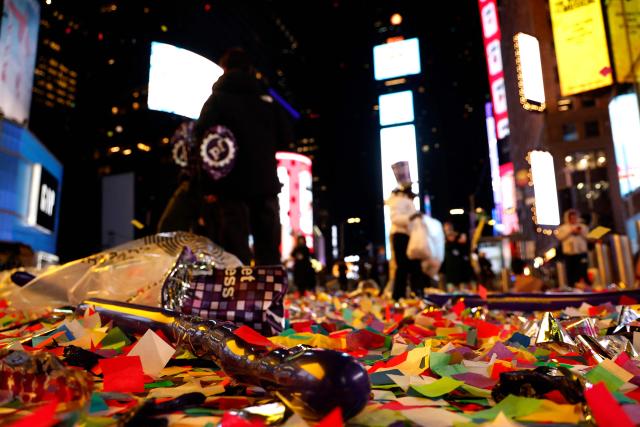 Confetti lie strewn after New Year's Eve celebrations and ball drop in Times Square in New York on January 1, 2026. (Photo by John Lamparski / AFP)