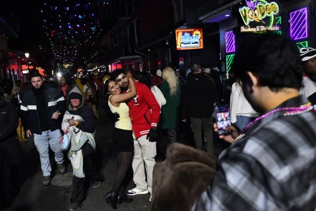 Partygoers celebrate the New Year at the French Quarter in New Orleans, Louisiana, on January 1, 2026. (Photo by Octavio JONES / AFP)