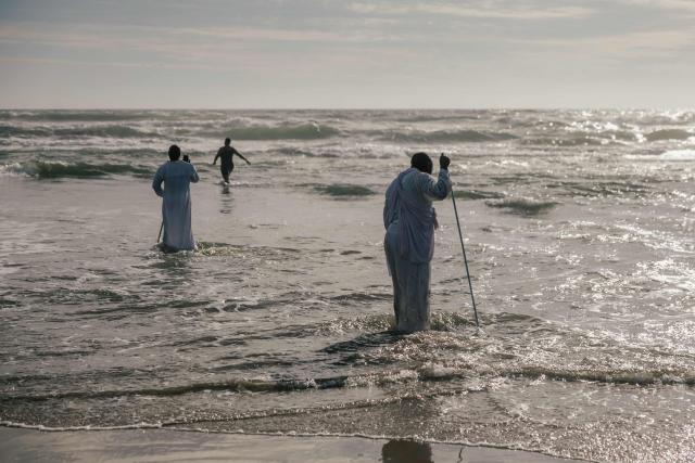 Members of the Zion Christian Church (ZCC) gather at the Durban North beach during New Year’s Day in Durban on January 1, 2026. (Photo by RAJESH JANTILAL / AFP)
