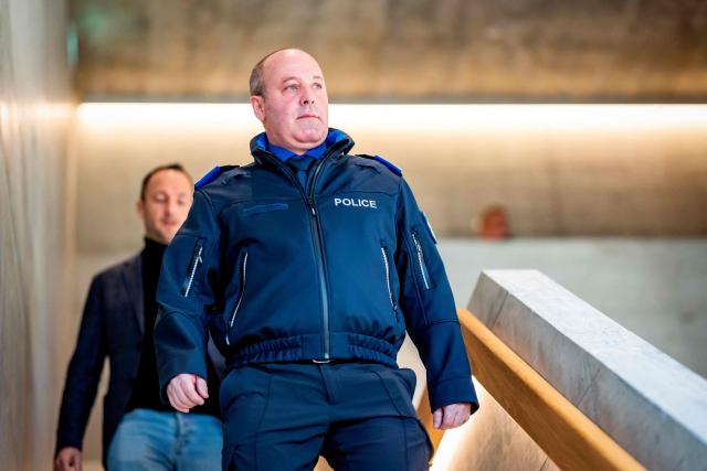 Frederic Gisler, commander of the Valais cantonal police, arrives for a press conference following an explosion that ripped through a bar in the luxury Alpine ski resort town of Crans-Montana on January 1, 2026. Several people were killed and others injured when an explosion ripped through a bar in the luxury Alpine ski resort town of Crans-Montana, Swiss police said early on January 1. (Photo by MAXIME SCHMID / AFP)