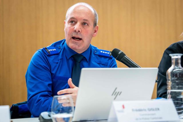 Frederic Gisler, commander of the Valais cantonal police, speaks during a press conference following an explosion that ripped through a bar in the luxury Alpine ski resort town of Crans-Montana on January 1, 2026. Several people were killed and others injured when an explosion ripped through a bar in the luxury Alpine ski resort town of Crans-Montana, Swiss police said early on January 1. (Photo by MAXIME SCHMID / AFP)