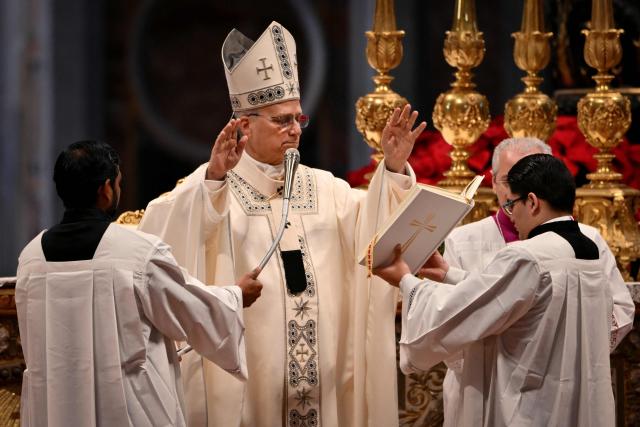 TOPSHOT - Pope Leo XIV presides over a Holy Mass for the Solemnity of Mary Mother of God as part of the New Year's celebrations in St. Peter's Basilica, at the Vatican, on January 1, 2026. (Photo by Alberto PIZZOLI / AFP)