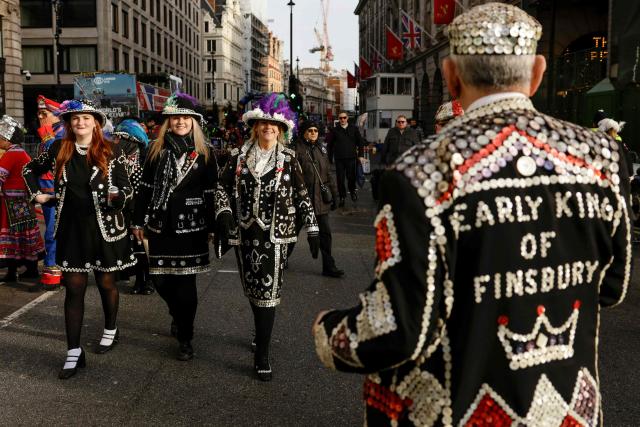 People prepare to take part in the annual New Year's Day parade as they gather ahead of the start in Green Park in central London on January 1, 2026. (Photo by Brook Mitchell / AFP)